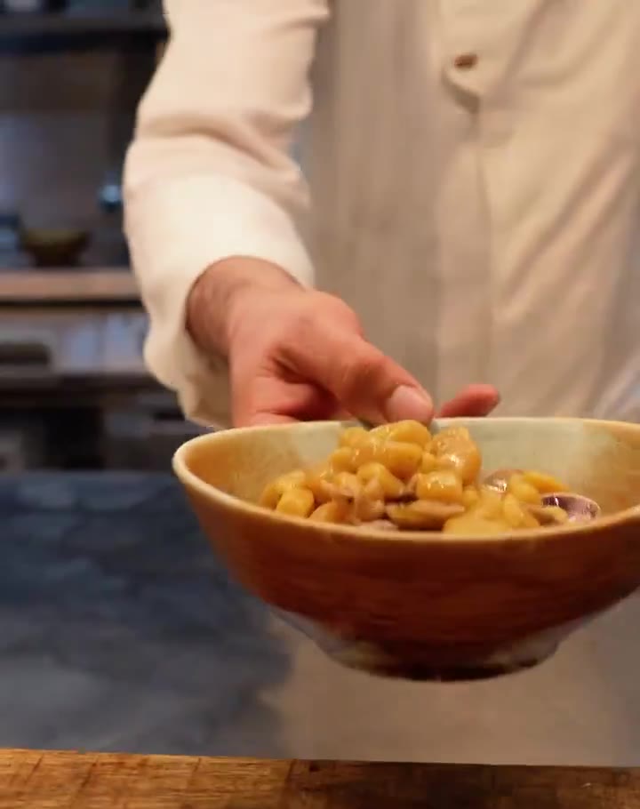 Gnocco di zucca con vongole, porcini e scorfano